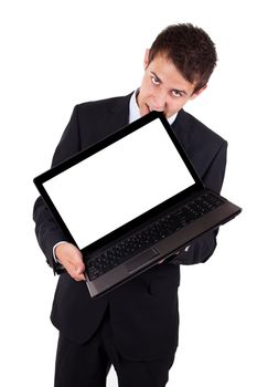 Angered businessman bites the laptop on a white background