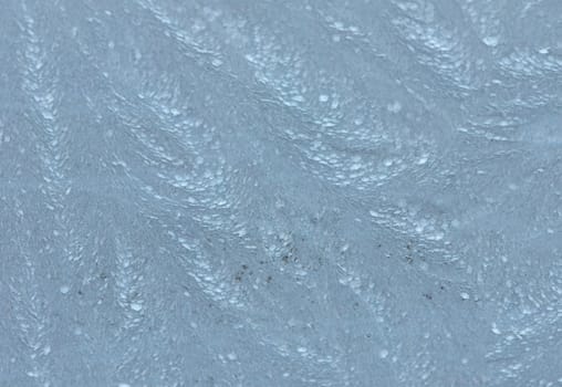 Light blue Metallic Surface covered with Frost