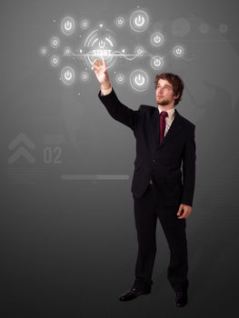 Businessman pressing simple start buttons on a virtual background