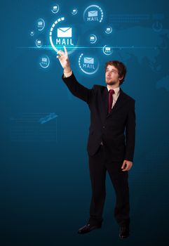 Businessman pressing messaging type of modern icons with virtual background