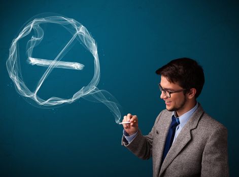 Handsome young man smoking unhealthy cigarette with no smoking sign