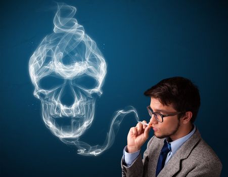 Handsome young man smoking dangerous cigarette with toxic skull smoke