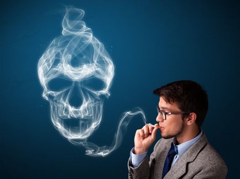 Handsome young man smoking dangerous cigarette with toxic skull smoke 