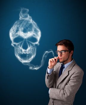 Handsome young man smoking dangerous cigarette with toxic skull smoke 