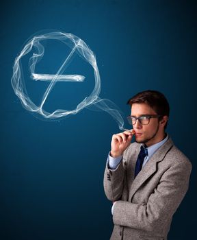 Handsome young man smoking unhealthy cigarette with no smoking sign