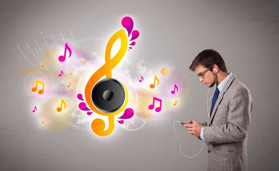 young man singing and listening to music with musical notes getting out of his mouth