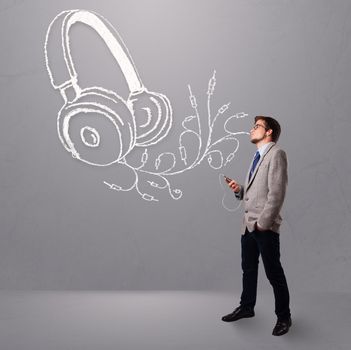 attractive man singing and listening to music with abstract headphone getting out of his mouth