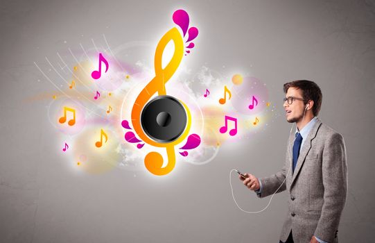 young man singing and listening to music with musical notes getting out of his mouth