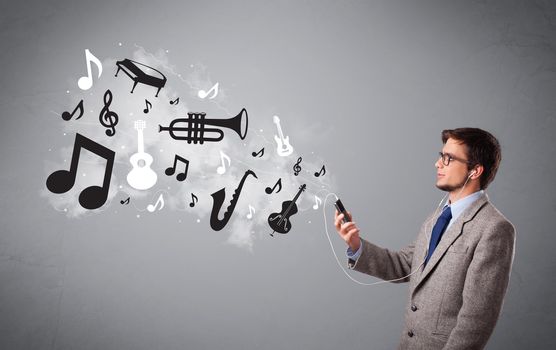 attractive young man singing and listening to music with musical notes and instruments getting out of his mouth