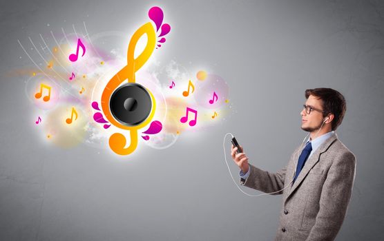 young man singing and listening to music with musical notes getting out of his mouth