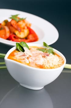 Thai shrimp soup bowl with rice.