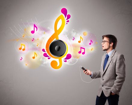 young man singing and listening to music with musical notes getting out of his mouth