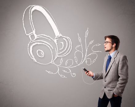 attractive man singing and listening to music with abstract headphone getting out of his mouth