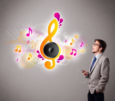 young man singing and listening to music with musical notes getting out of his mouth