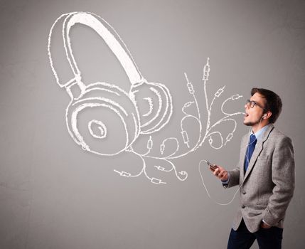 attractive man singing and listening to music with abstract headphone getting out of his mouth