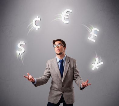 Attractie young man standing and juggling with currency icons