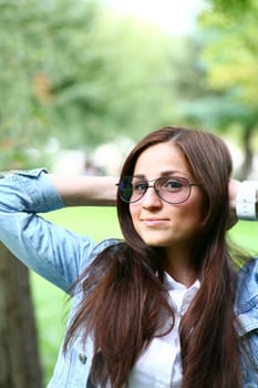 A Fresh Faced Girl With a beautiful face and green background