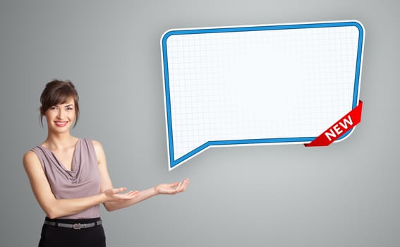 Beautiful young woman presenting modern speech bubble copy space
