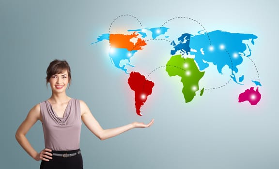 Beautiful young woman presenting colorful world map