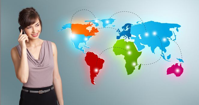 Beautiful young woman making phone call with colorful world map