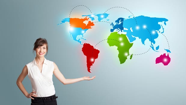 Beautiful young woman presenting colorful world map