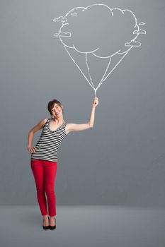 Pretty young lady holding a cloud balloon drawing