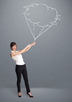 Pretty young lady holding a cloud balloon drawing