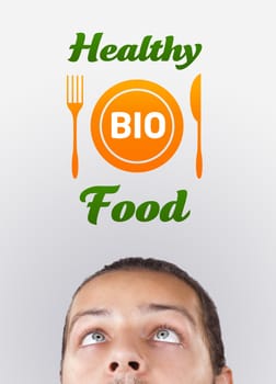 Young persons head looking with gesture at healthy food sign