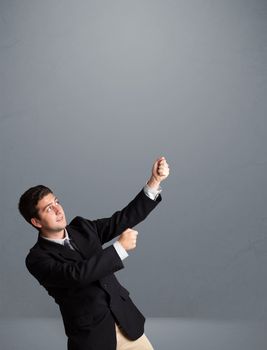 Attractive young man gesturing with copy space