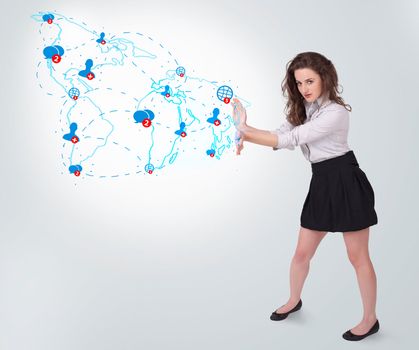 Young business woman presenting social map on bright background