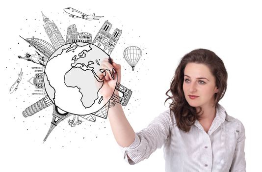 Young woman drawing a globe on whiteboard isolated on white