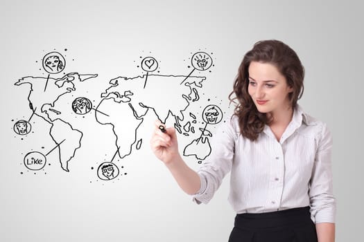 Young woman drawing a social map on white whiteboard