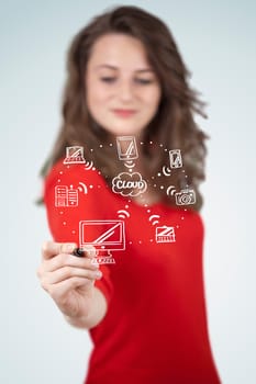 Young woman drawing a cloud computing on white whiteboard