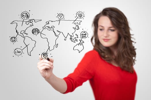 Young woman drawing a social map on white whiteboard