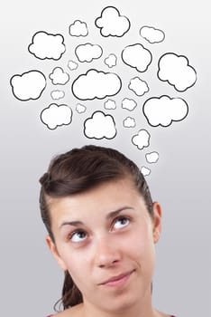 Young girl head thinking about white clouds