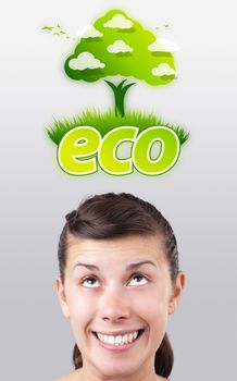 Young girl head looking at green eco sign