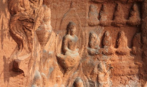 Buddha figures carved in stone, in Leshan Giant Buddha Area
