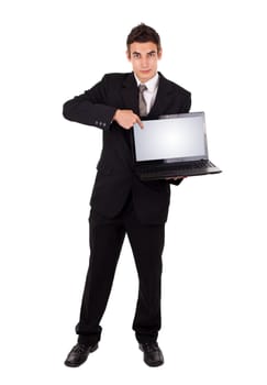 Business man pointing at a laptop computer isolated on white