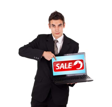 Business man pointing at a laptop with sale sign, isolated on white