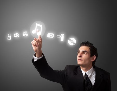 business man pressing a MUSIC button 