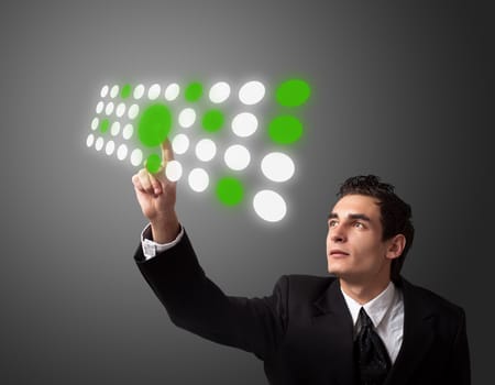 Business man pressing a touchscreen button. 