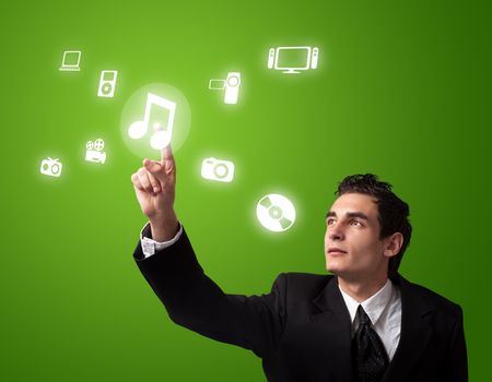 business man pressing a MUSIC button 