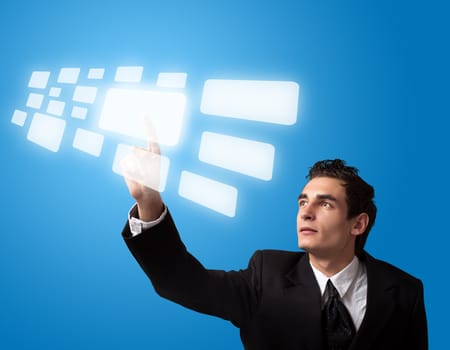 Business man pressing a touchscreen button. 