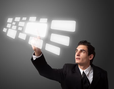 Business man pressing a touchscreen button. 