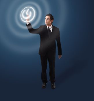 business man pressing ON / OFF button