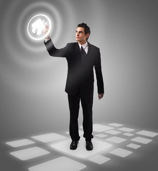 business man pressing HOME button, futuristic digital technology