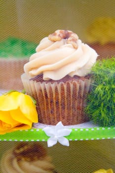 A variety of cupcakes from a dessert buffet at a wedding reception.