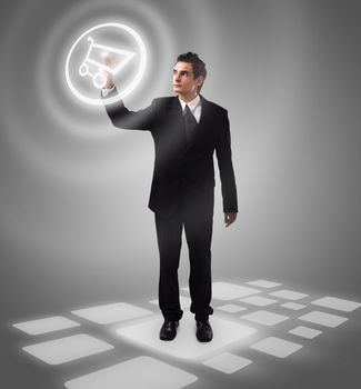 Business man pressing  shopping cart button, futuristic digital technology