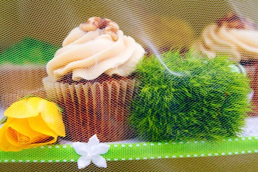 A variety of cupcakes from a dessert buffet at a wedding reception.