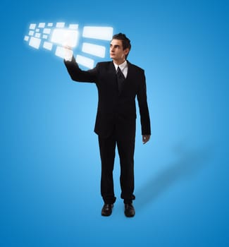 Business man pressing a touchscreen button, futuristic digital technology